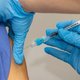 Healthcare workers receive an injection of the Pfizer-BioNTech Covid-19 vaccine at St James’s Hospital in Dublin on December 29, 2020.